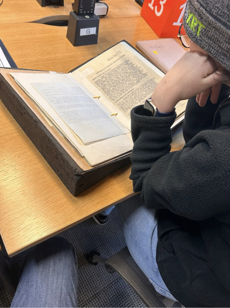 Madeleine pouring over SOE documents at the national archives